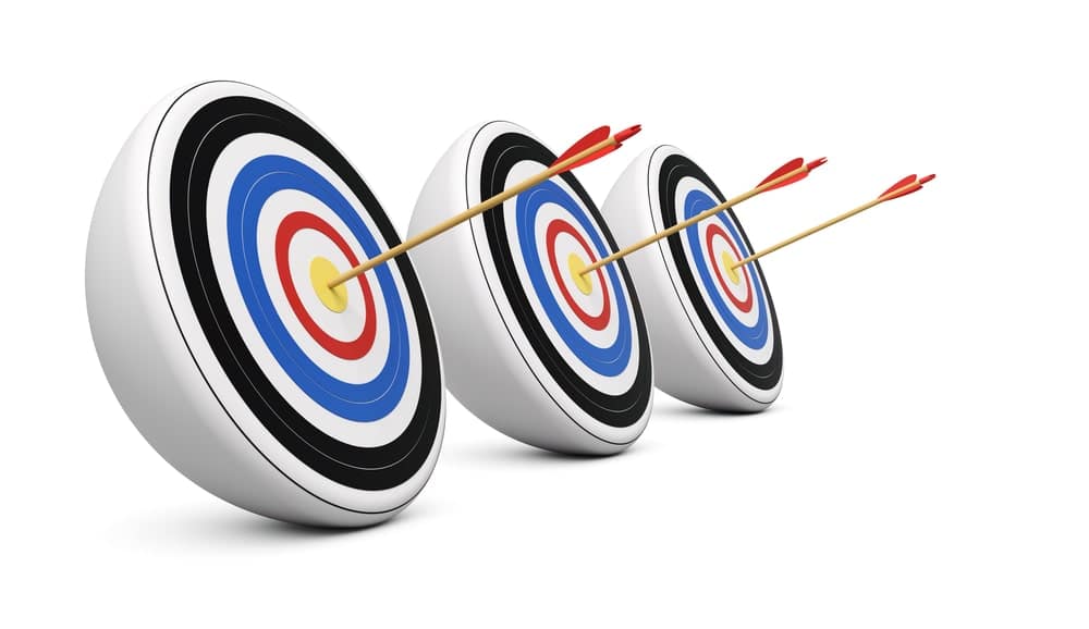 3 arrows in bullseyes of 3 targets