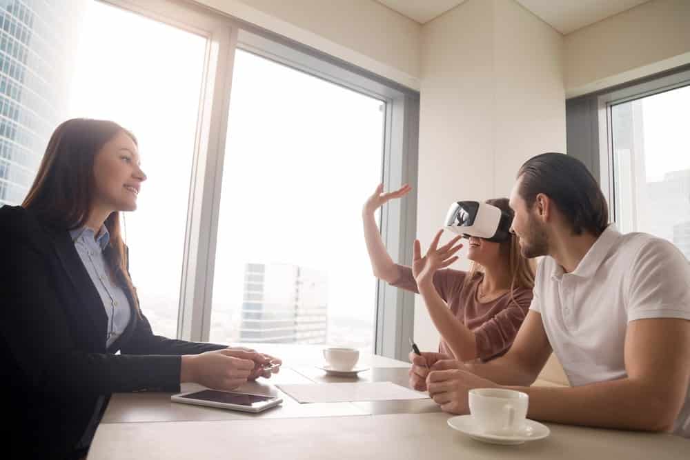 meeting with woman using virtual reality goggles