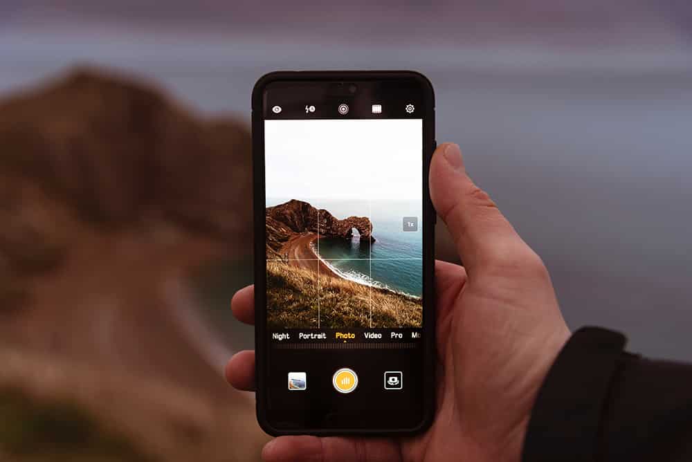 Phone taking a picture of beach